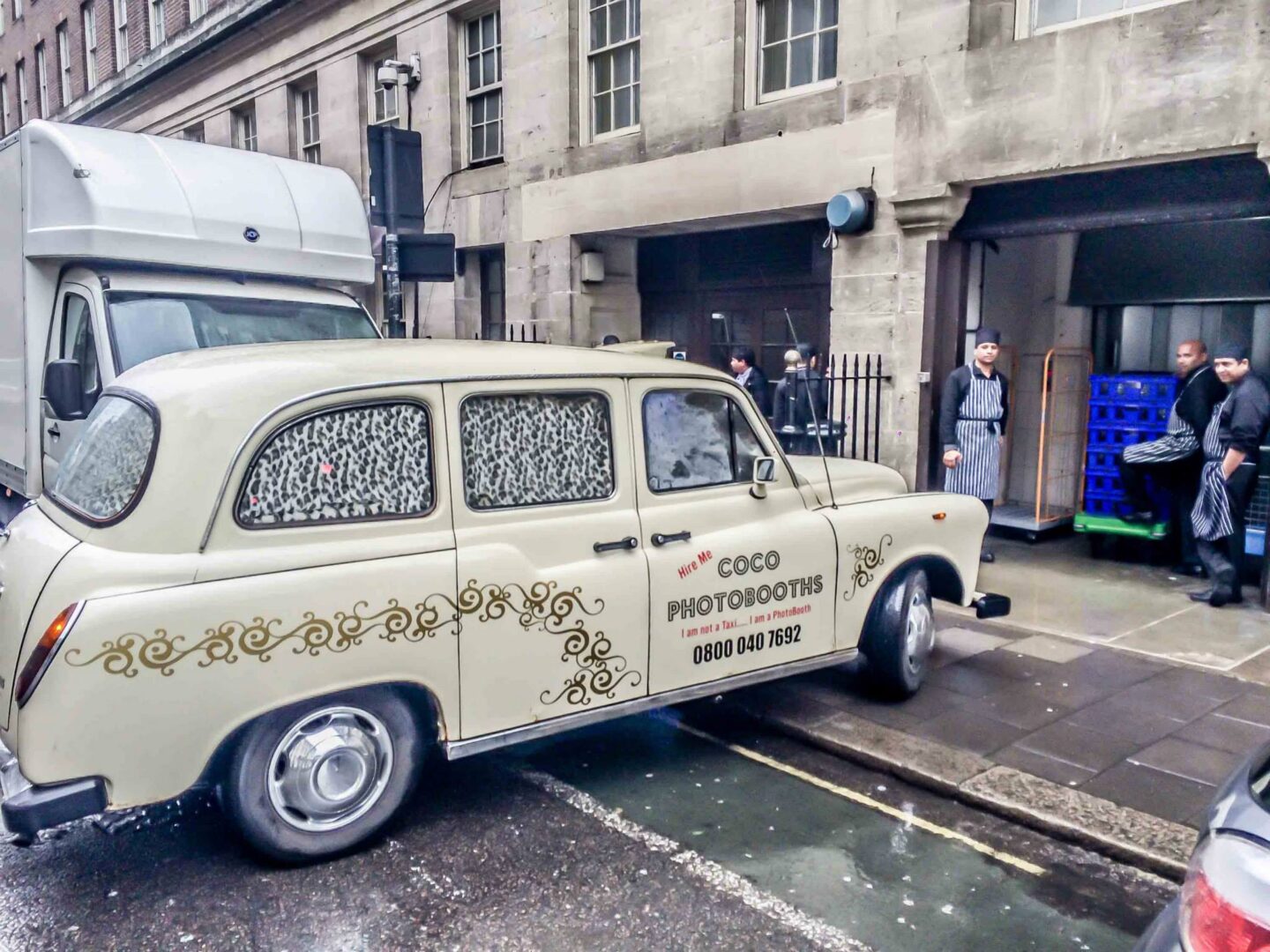 white london taxi photo booth entering the great room from the street london