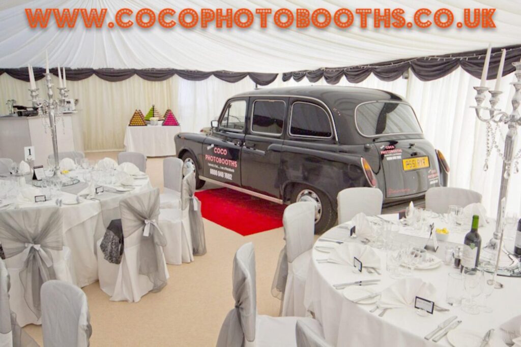 black taxi photo booth in a marquee