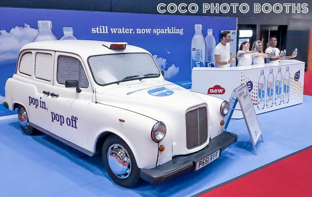 white branded taxi coco photo booth for a promotion in manchester 