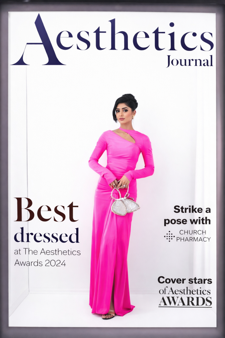 girl in a pink dress magazine walkin in magazine photo booth london